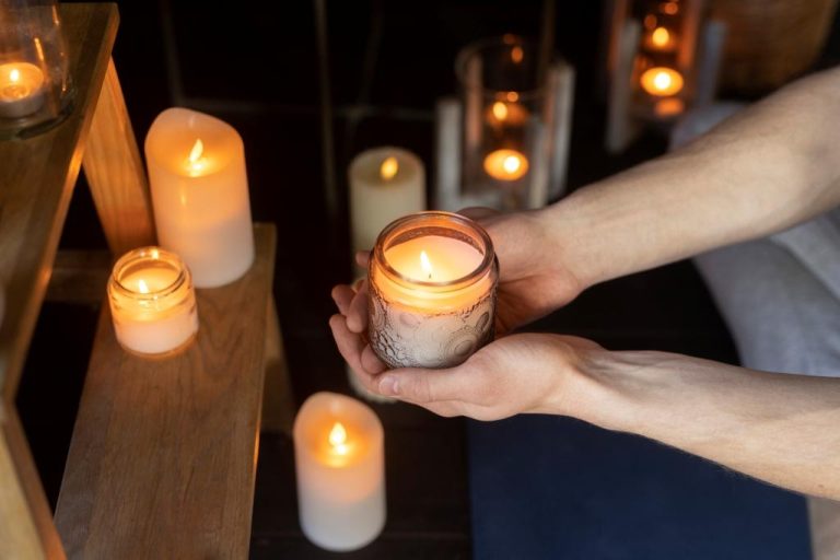 high-angle-man-holding-candle
