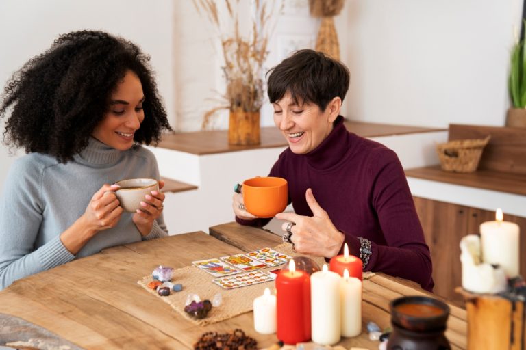 medium-shot-women-reading-tarot