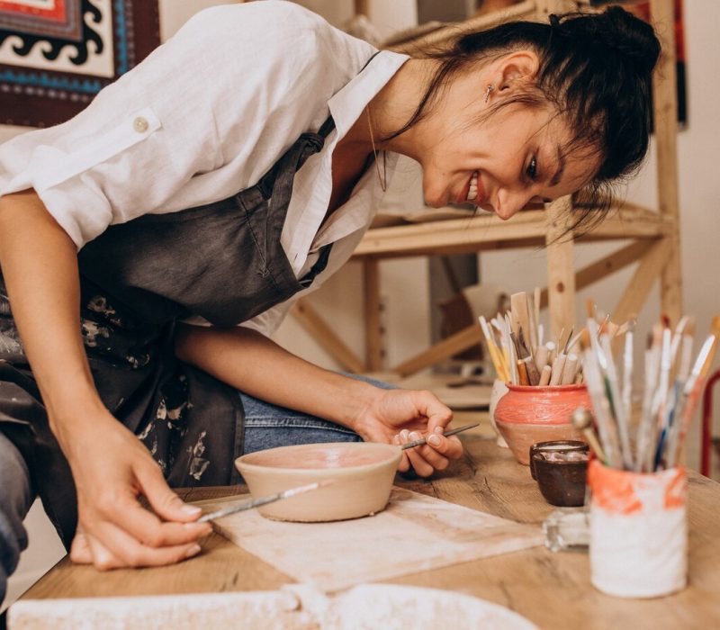 woman-craftmaster-pottery-shop_1303-23726